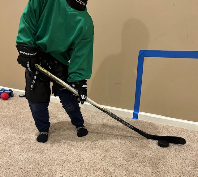 Get Your Kid Dressed for Hockey - stick